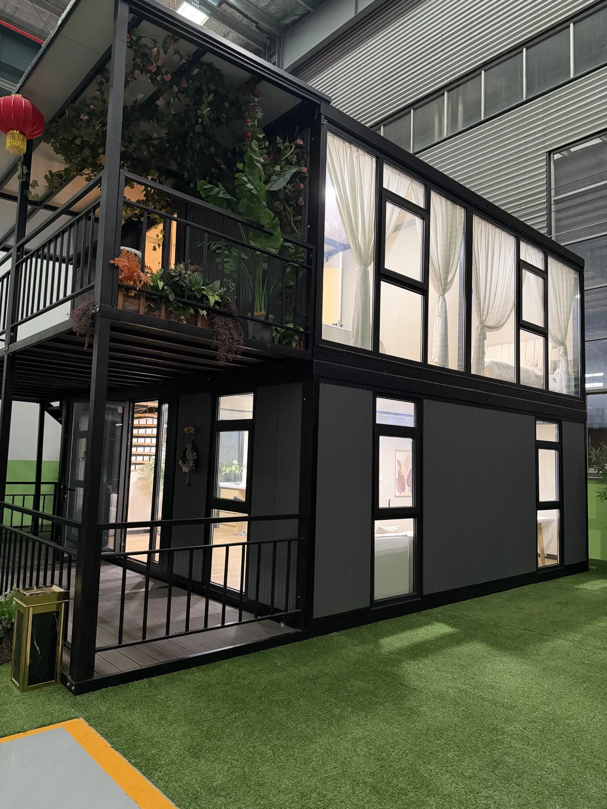 Double-storey expandable house exterior with balcony