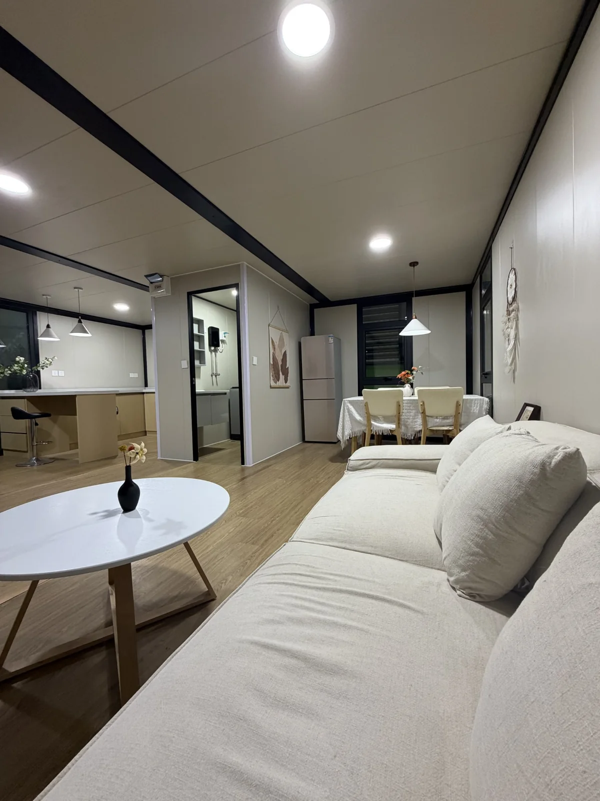 Living and dining interior in double-storey expandable house