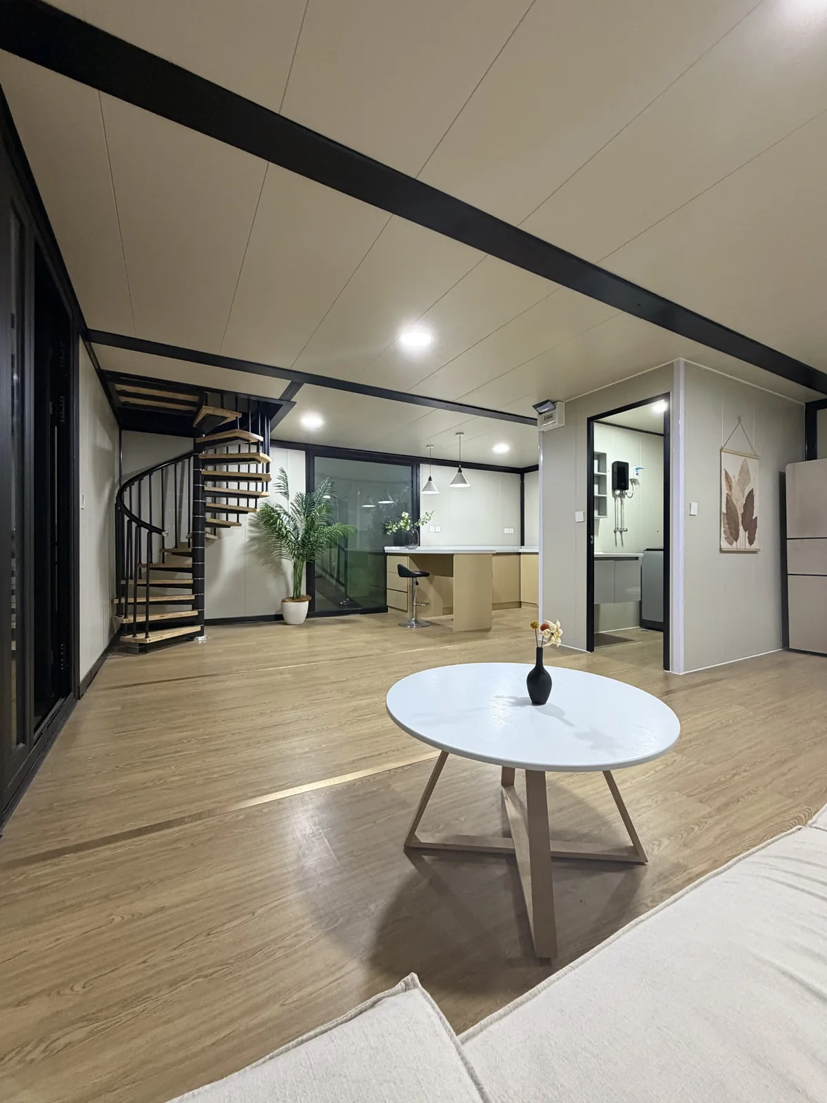 Open living and kitchen interior in a double-storey expandable house
